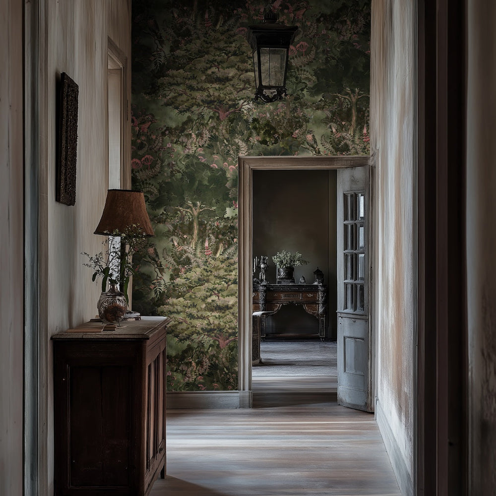 Arcadia wallpaper by Kate Walton in a hallway: hand-painted English countryside with trees, wildflowers and wildlife
