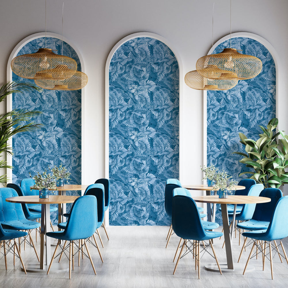 Raven Fleet wallpaper in Topaz by Kate Walton: hand-painted ravens in flight across a restaurant wall
